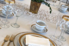 White lamour linen with Imperial gold china set and gold flatware